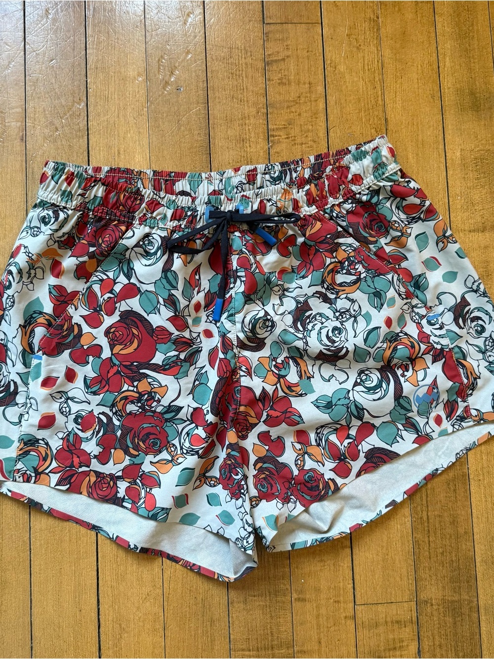 Janji Women's Floral athletic Shorts - Red, Teal & Tan